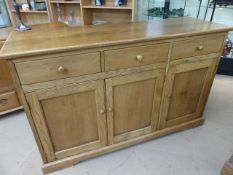 Chichester Oak sideboard with three drawers and three cupboards by Cathedral furniture