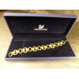 Swarovski 18ct heavily plated bracelet set with swarovski crystals, slight rubbing to plate in