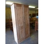 Tall pine two door cupboard
