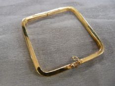 Gold Bangle (tested 14ct or above) of square form. Weight approx 19.1g