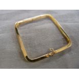 Gold Bangle (tested 14ct or above) of square form. Weight approx 19.1g