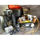 Leather cased Telstar binoculars 20x65, pair of Tasco binocular, Nikon Sprint, Halina Camera, and