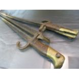 Pair of Early english Bayonets - both which have been converted (Trench Art) into a Fire stoker