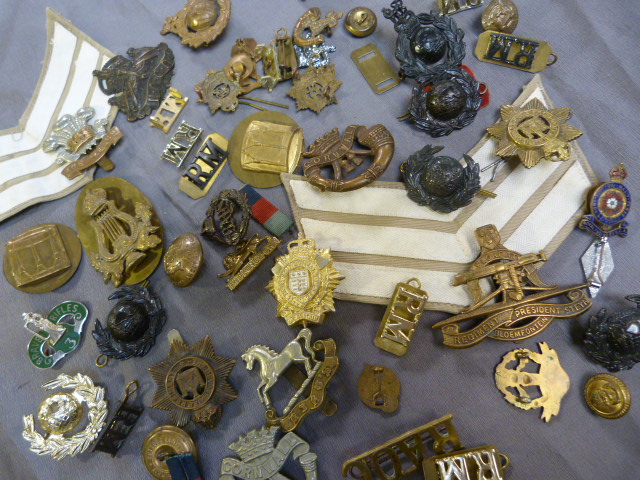 Large collection of Cap Badges and Hat badges from mostly local Regiments - Devonshire Regiment,