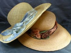 Two Mulberry England vintage straw, wide-brimmed summer hats. One decorated with a large fabric blue