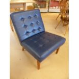 Barcelona style blue button back chair on wooden legs