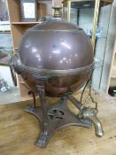 Unusual copper and brass spherical Samovar on long thin tapering legs leading to claw feet. Ring