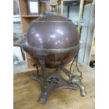 Unusual copper and brass spherical Samovar on long thin tapering legs leading to claw feet. Ring