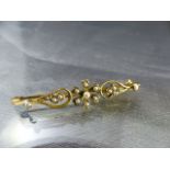 Boxed 15ct Gold Seed pearl bar brooch, the floral design brooch measures approx 10.35mm x 487mm