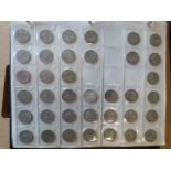 Collecta coin case with 8 sleeves all of which are nearly full. Mainly containing English and