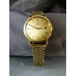 Omega Gents gold watch with champagne dial and Swiss Hallmark 18ct (750) gold case. The bracelet