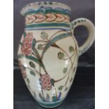 Honiton Pottery - Large and unusual coloured Collard Honiton Pottery jug, with slip handle. Marked