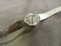 9ct White Gold Wrist Watch by Bueche Girrod with Bark texture design bracelet also 9ct white Gold.