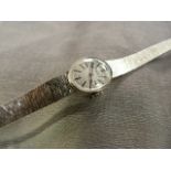 9ct White Gold Wrist Watch by Bueche Girrod with Bark texture design bracelet also 9ct white Gold.