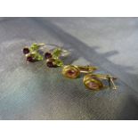 2 Pairs of Gold Gem set earrings (1) 18ct (750) set with oval pink stone. (2) 9ct (375) stylised