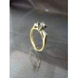 18ct Hallmarked Diamond Solitaire Ring - The round brilliant cut diamond is set into illusion set