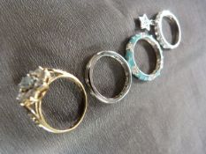 Mixed lot of four rings - 9ct CZ ring, Oval aquamarine type stone with 8 CZ stones around it. Size