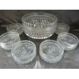 Cut glass dessert bowl with six serving bowls in the same pattern