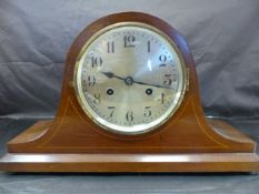 An Edwardian German Oak-Cased Napoleon Mantle Clock, with silvered face, movement stamped DRGM, nr