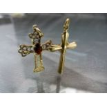 Two 9ct Gold crosses one with inset red stone (Total weight 1.8g)