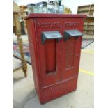 Cast iron two section Postage Stamp dispenser in red