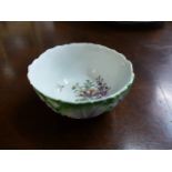 A very rare Bow bowl, hand painted polychrome colours with leaf decoration with purple stalks, the