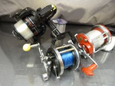 Penn Surfmaster Reel, Intrepid Fastback reel and a Stiffi FW070 along with spare line