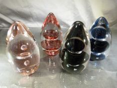 WEDGWOOD GLASSWARE - Four Wedgwood marked paperweights in the form of a Teardrop.