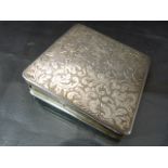 Continental hallmarked silver (925) compact. The front highly decorated with engineered floral