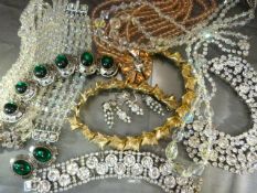 Seven boxes of costume Jewellery to include ornate necklaces and a Bracelets (one marked "CARTIER")