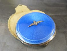 Hallmarked silver and Blue Guilloche enamel compact bearing RAF badge and wings. Retailed by