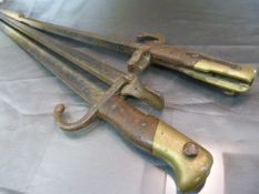 Pair of Early english Bayonets - both which have been converted (Trench Art) into a Fire stoker