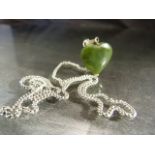 Jade heart shaped stone pendant on silver metal chain with small Albert