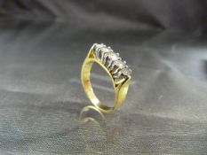 18ct Gold 5 stone Diamond Ring. (Centre stone approx: 20pts) Size approx: ‘N’ for UK, ’6 ½’ USA,