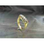 18ct Gold 5 stone Diamond Ring. (Centre stone approx: 20pts) Size approx: ‘N’ for UK, ’6 ½’ USA,