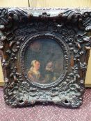 Large ornate and plaster frame with ovular print to middle