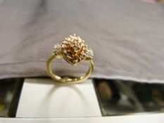9ct Gold (Birmingham 2011) Marquise shaped Diamond set ring. The Central section of Rose Coloured