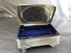 Edwardian Hallmarked silver trinket box on hoofed feet. Pretty yet simple design having inset oval