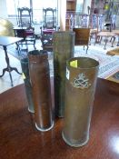 Four Pieces of Simplistic Trench art in the form of Shell cases. Some with badges to front