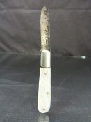 Hallmarked silver fruitknife with engraved M.O.P handle. Hallmarks for Henry Williamson Ltd