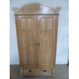 Antique Scandinavian Pine Two door wardrobe with carved decorative domed frieze at top.