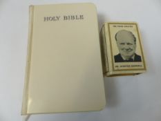 Celluloid covered bible and a Winston Churchill promotional match box holder