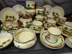 Large collection of Watcombe Torquay Motto Ware, to include Cups and saucers, Jugs, teapot and