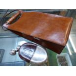 Leather wine cooler bag and a Victorian Leather and silver plated hip flask.