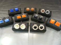 9 sets of silver hallmarked cufflinks in display boxes