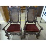 Good Example of a Pair of Carolean open arm chairman style chairs. The highly carved chair has a