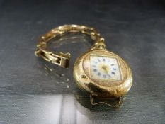 Ladies Fob watch with 14ct case and 9ct strap (A/F)