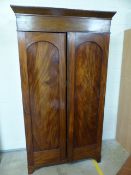 William and Mary two door flamed mahogany wardrobe with planked back. (Back leg A/F)