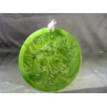 Chinese Jade circular pendant (approx 5.5cm diam) carved to both sides. One side with the dragon