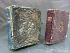 Hallmarked silver fronted ecclesiastical communion miniature book decorated with cherubs within a